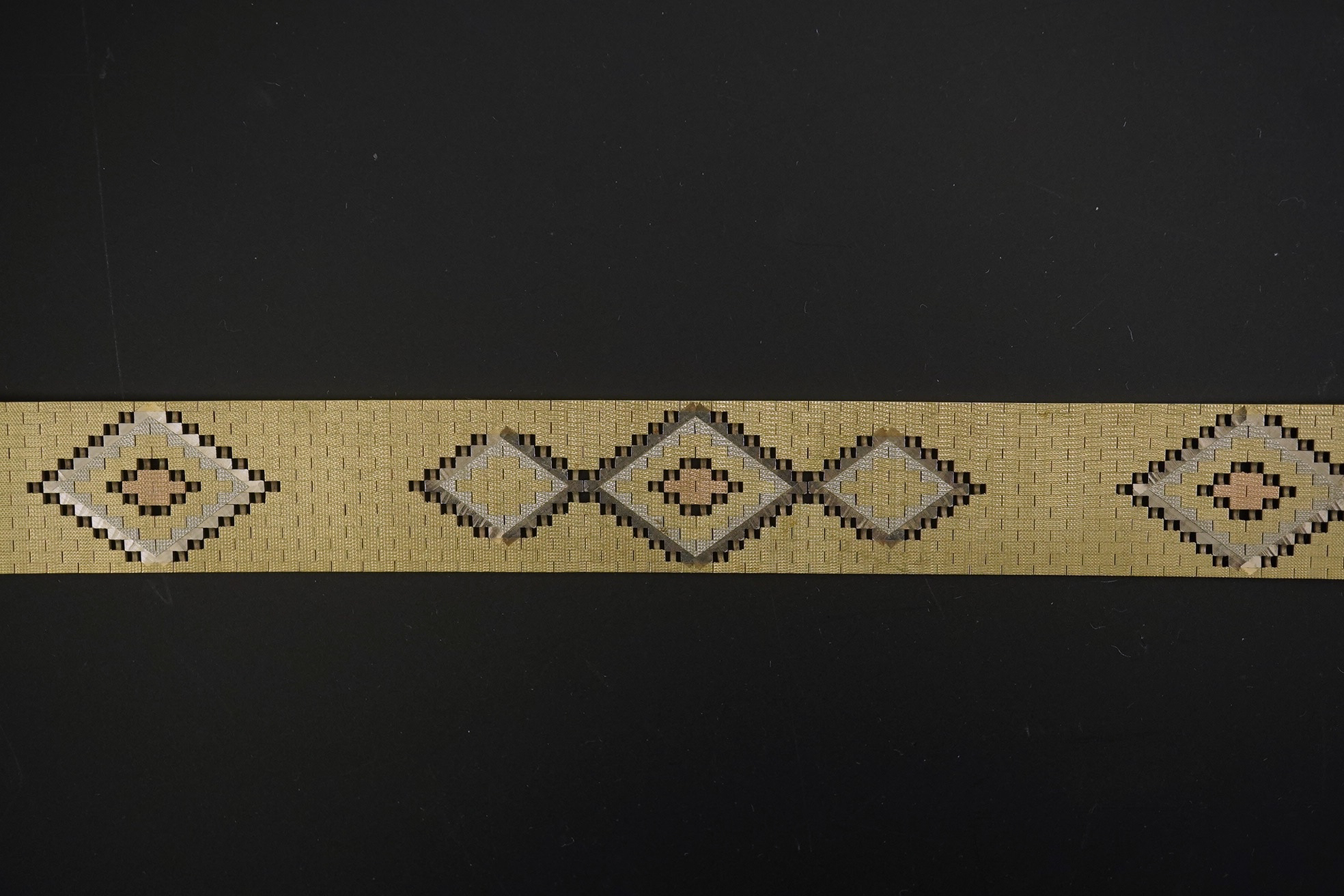 A 1980's three colour 9ct gold bracelet